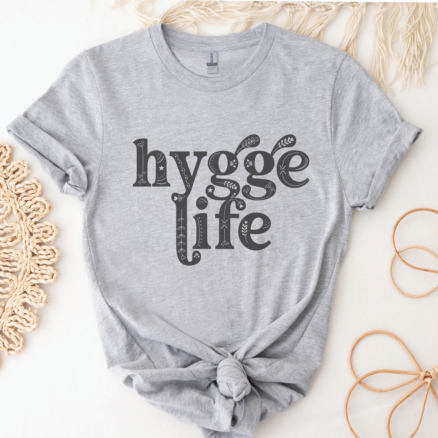 Coziness vibes heather gray Hygge Life Holy Hygge Women's unisex Christian t-shirt with Scandinavian floral and heart art for the cozy fall and winter season
