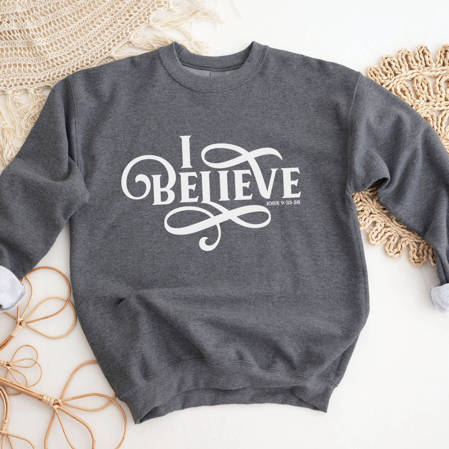Cozy heather dark gray I BELIEVE John 9:35-38 bible verse women's Christian unisex sweatshirt, designed for faith-filled Jesus believers in size small, medium, large, XL, 2XL, 3XL, 4XL