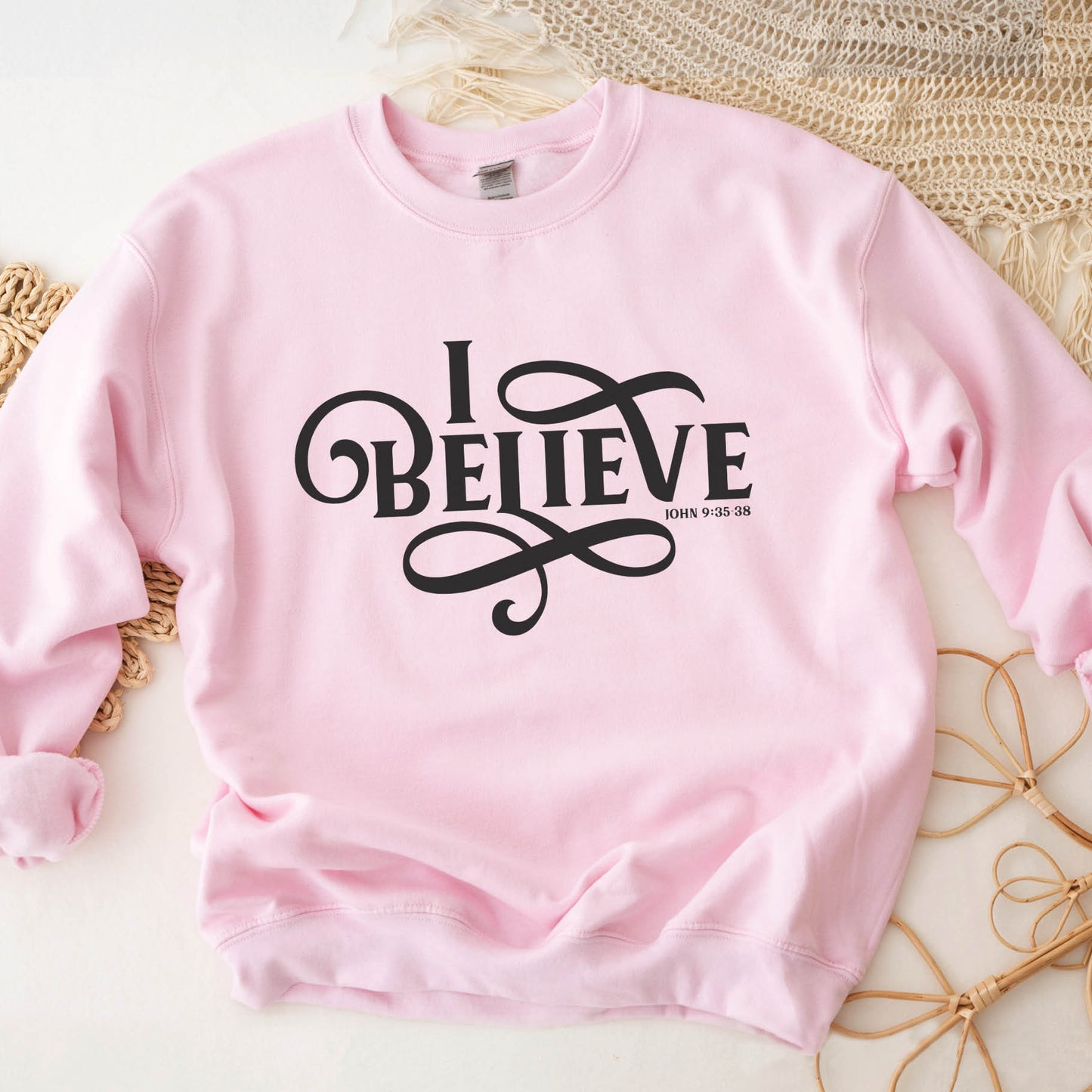 Light pink I BELIEVE John 9:35-38 bible verse women's Christian unisex cozy sweatshirt, designed for faith-filled women, size small, medium, large, XL, 2XL, 3XL, 4XL