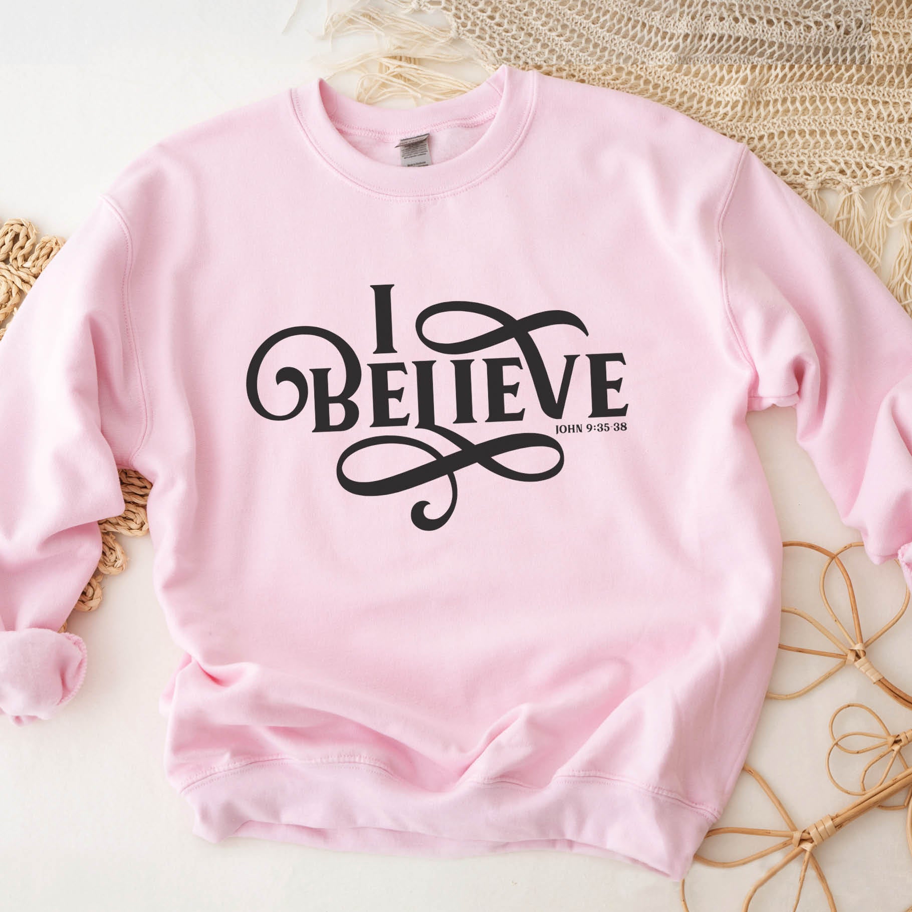 Light pink I BELIEVE John 9:35-38 bible verse women's Christian unisex cozy sweatshirt, designed for faith-filled women, size small, medium, large, XL, 2XL, 3XL, 4XL