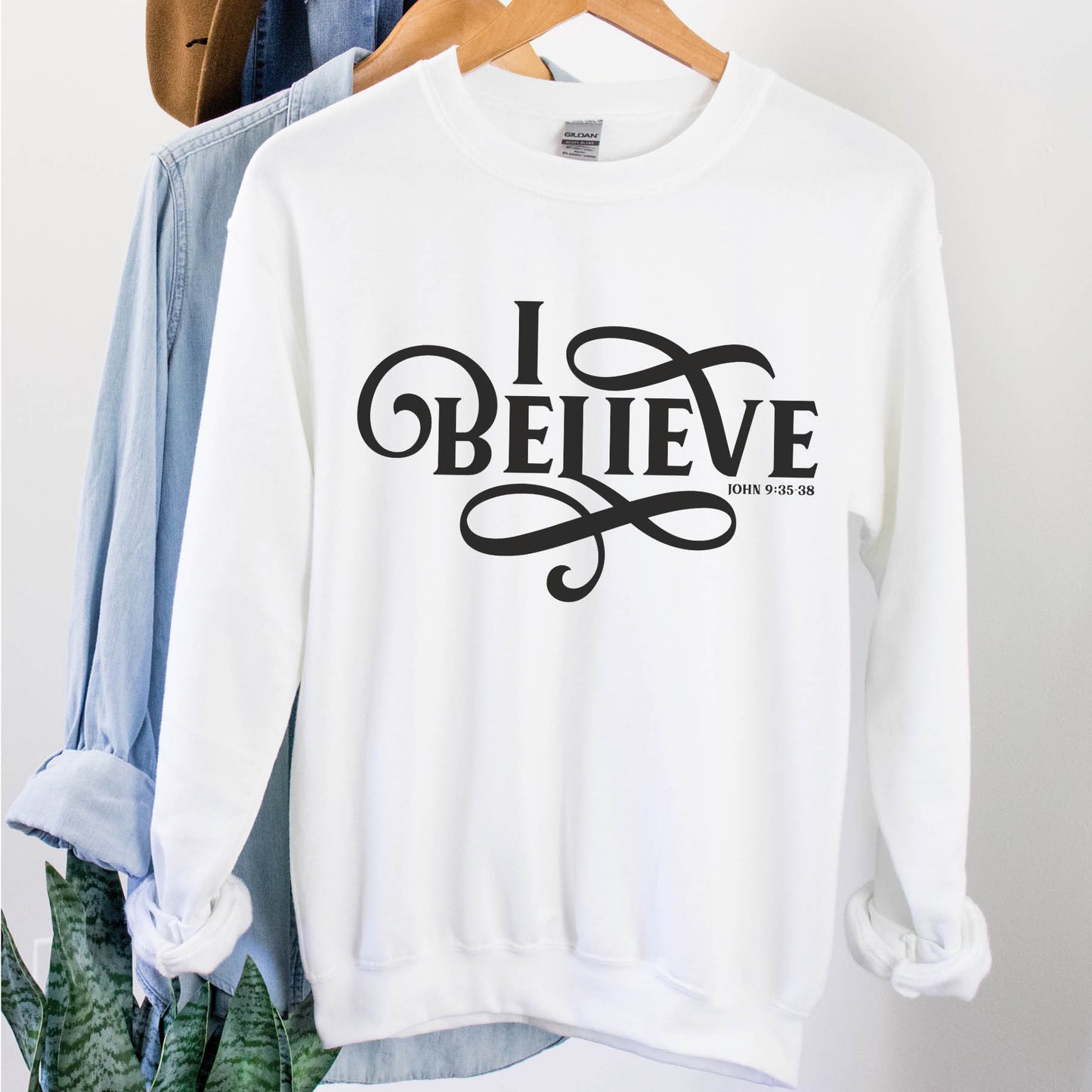 Cozy white I BELIEVE John 9:35-38 bible verse women's Christian unisex sweatshirt, designed for faith-filled Jesus believers in size small, medium, large, XL, 2XL, 3XL, 4XL