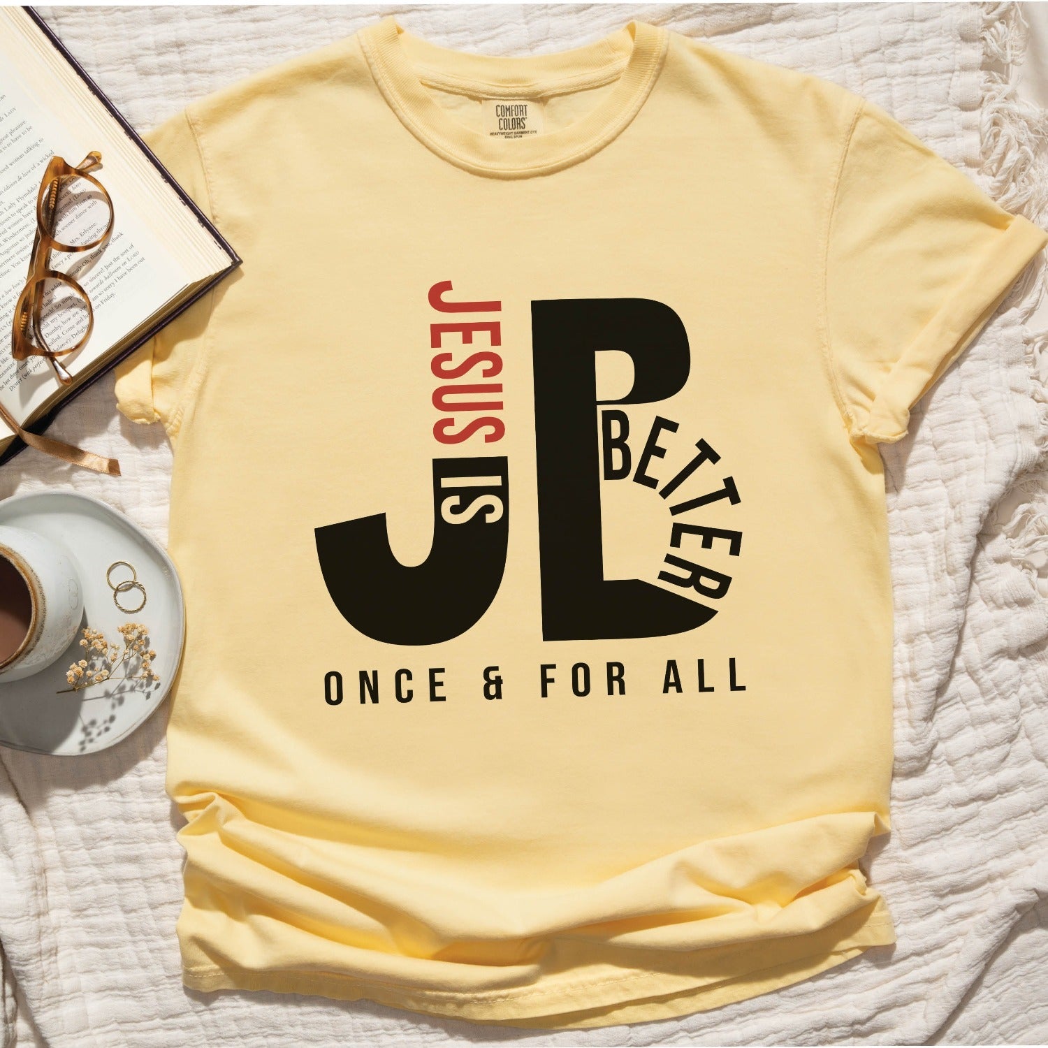 Butter soft yellow color JB typography Jesus is Better Once and For All Christian book of Hebrews Unisex Comfort Colors C1717 t-shirt, created for faith-based women and men