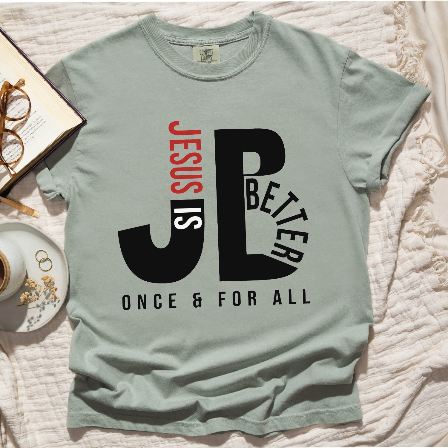 Bay sage green color JB typography Jesus is Better Once and For All Christian book of Hebrews Unisex Comfort Colors C1717 t-shirt, created for faith-based women and men