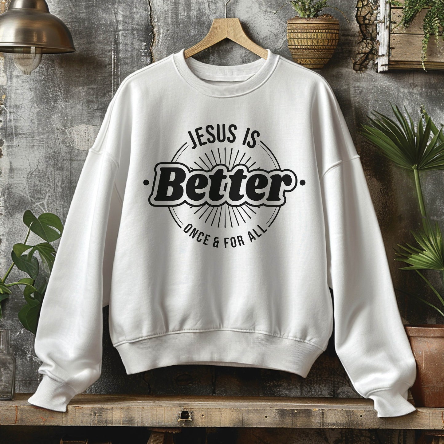 White faith-based cozy sweatshirt with "Jesus is BETTER - Once and For All" logo style design in black, created for Christian men and women