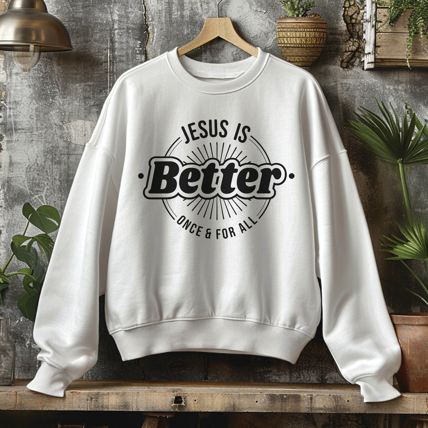 White faith-based cozy sweatshirt with "Jesus is BETTER - Once and For All" logo style design in black, created for Christian men and women