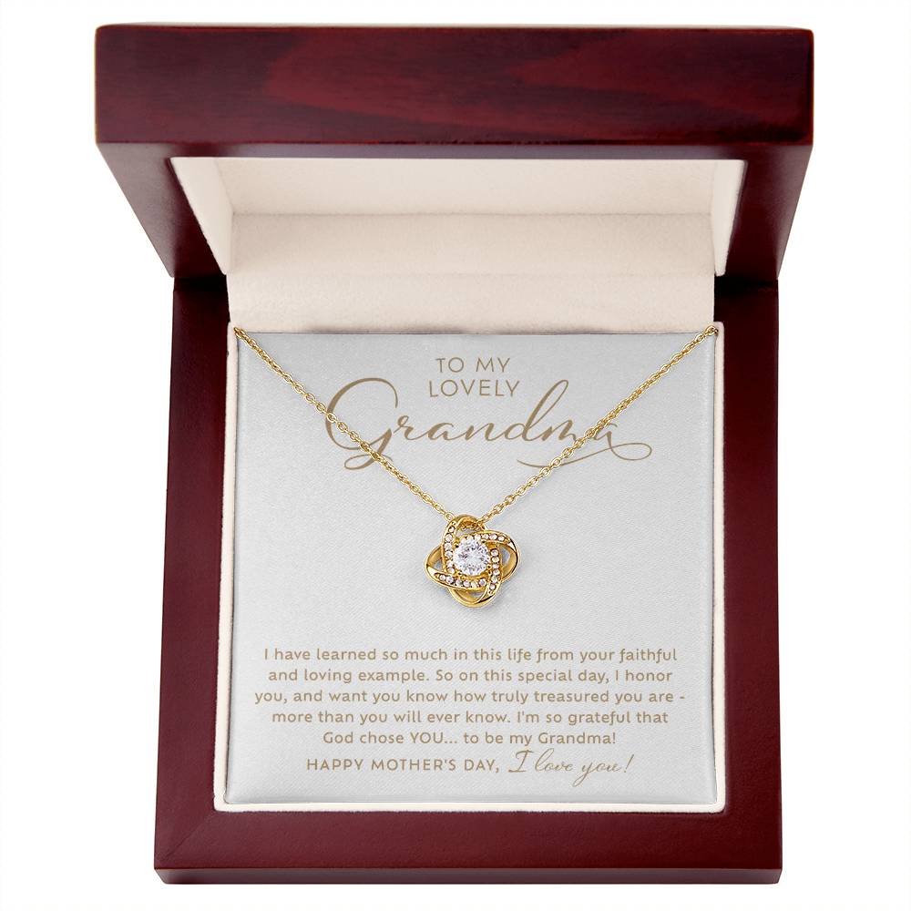 To my Lovely Grandma 18k yellow gold sparkling cubic zirconia Love Knot necklace Happy Mother's Day Gift to Grandmother with heart warming message card nestled inside luxury LED light mahogany jewelry gift box