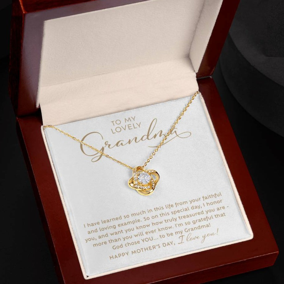 To my Lovely Grandma 18k yellow gold sparkling cubic zirconia Love Knot necklace Happy Mother's Day Gift to Grandmother with heart warming message card nestled inside luxury mahogany jewelry gift box