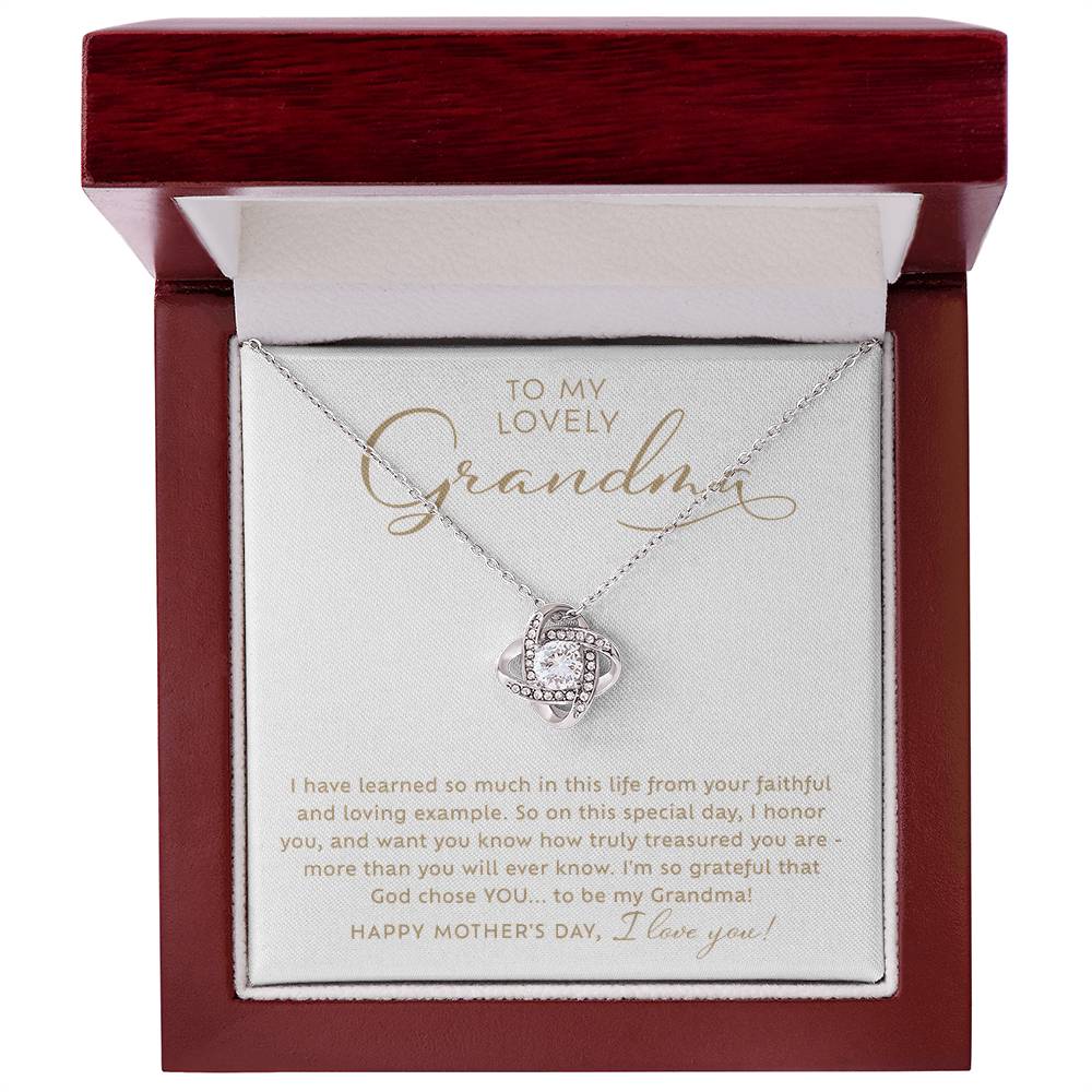 To my Lovely Grandma 14k white gold sparkling cubic zirconia Love Knot necklace Happy Mother's Day Gift to Grandmother with heart warming message card nestled inside luxury LED light mahogany jewelry gift box