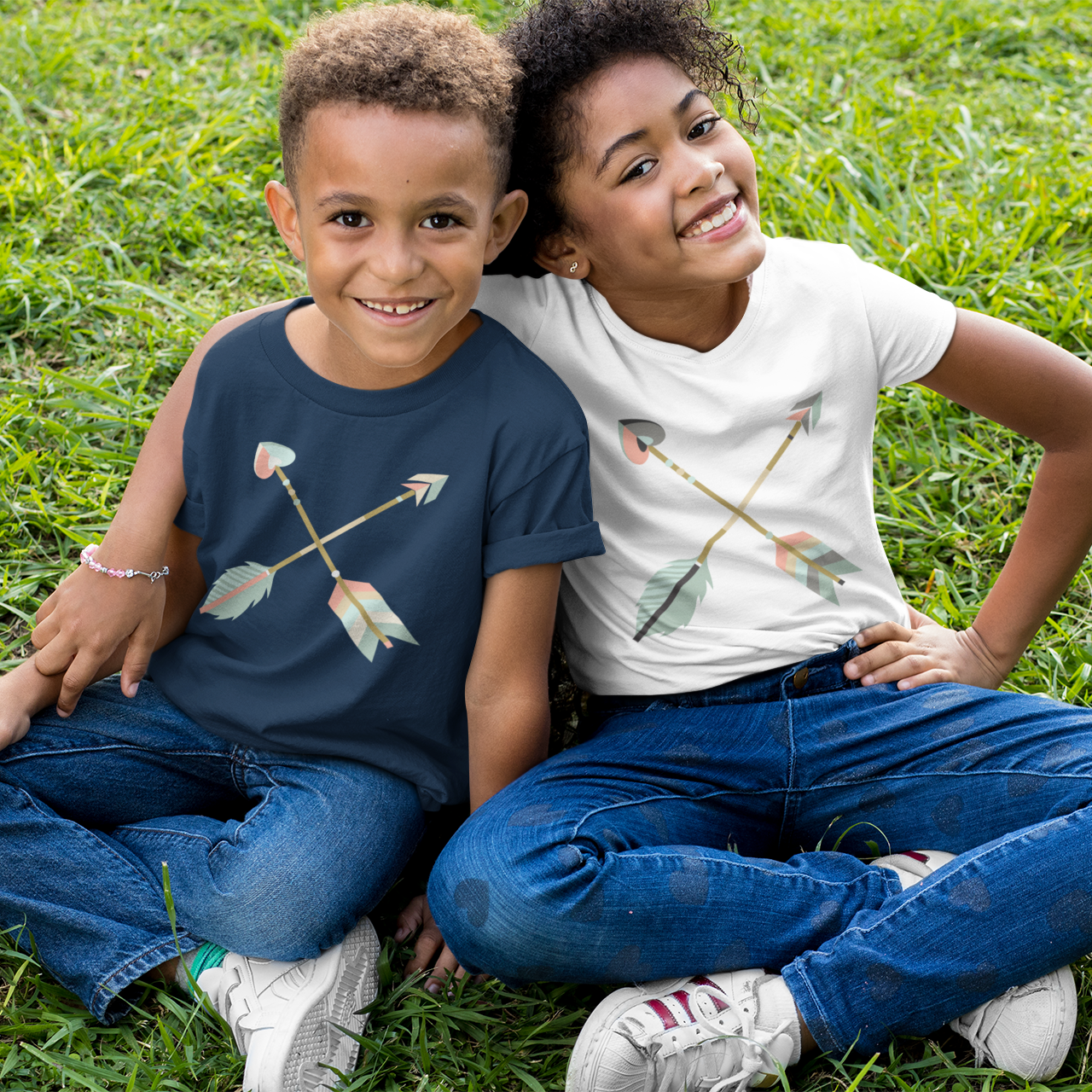 Siblings wearing youth kids size navy blue and white boho crisscross arrows Christian faith-based scripture t-shirt, matching mommy-and-me women's Mom "Raising Arrows" homeschool family tee