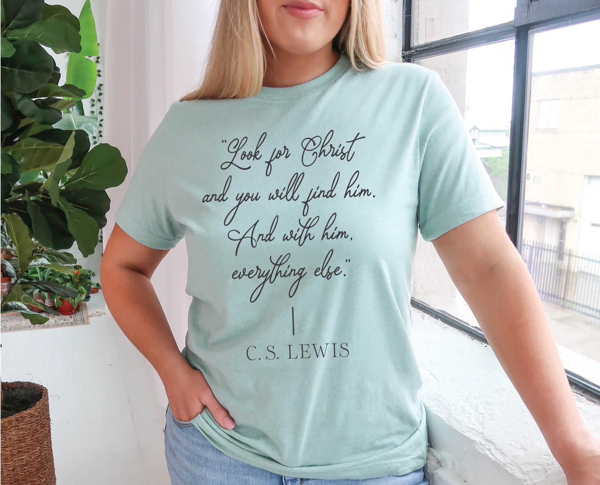 Soft quality heather dusty blue t-shirt with British writer Narnia author C.S. Lewis quote "Look for Christ and you will find him. And with him, everything else."  printed in black vintage script - Christian aesthetic unisex tee shirt design for women