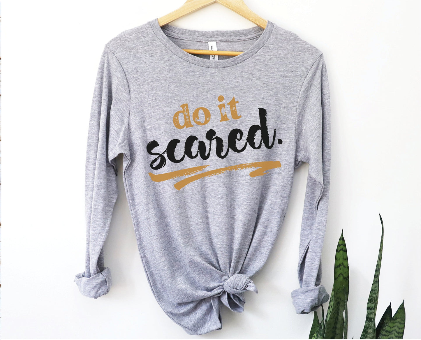 Do It Scared faith over fear 2 Timothy 1:7 do not fear bible verse Christian aesthetic design printed in black and gold on soft heather gray unisex long sleeve tee shirt for women and men