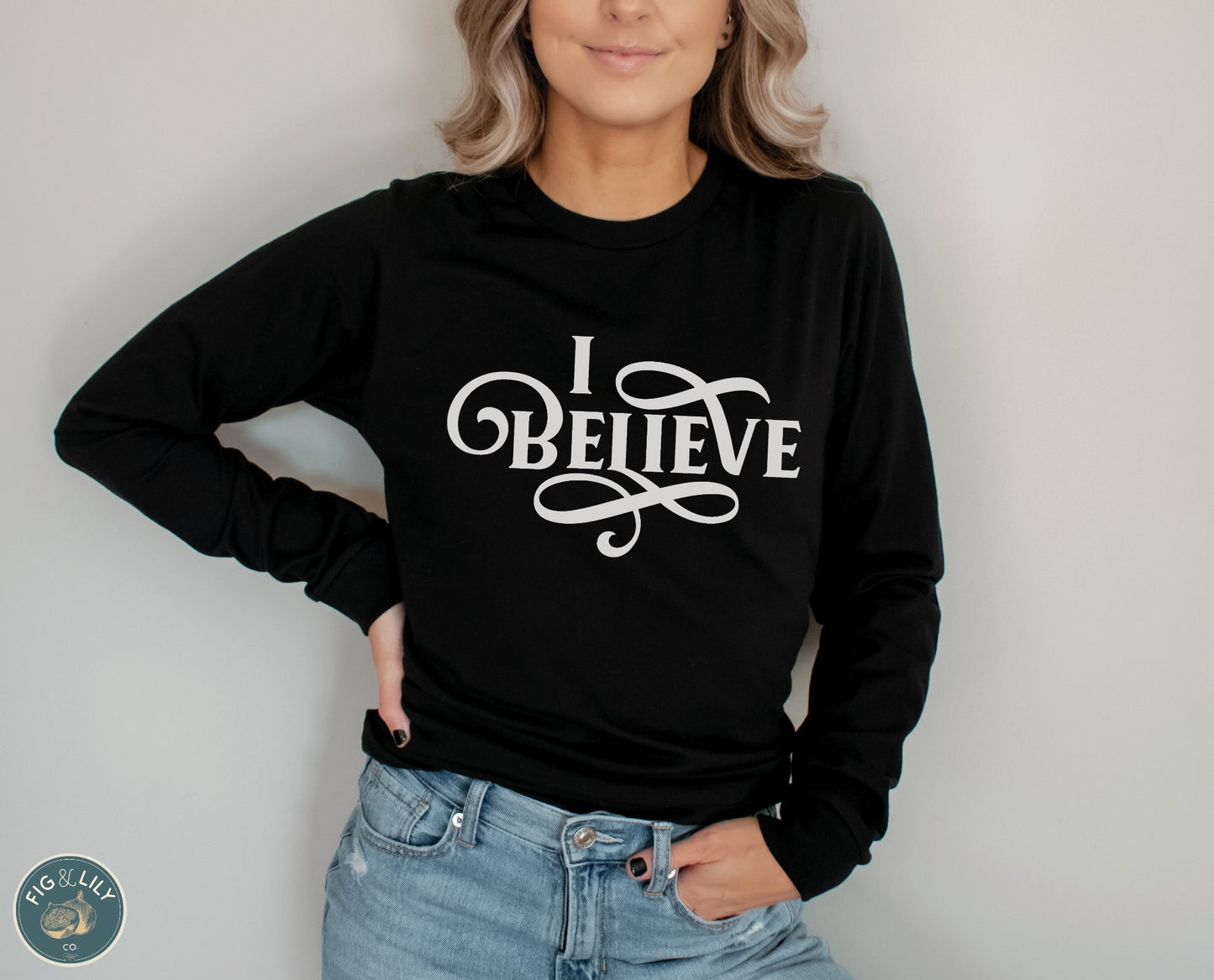 I Believe Swirl Christian aesthetic Jesus believer design printed in white on soft black long sleeve tee for women