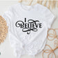 I Believe Swirl Christian aesthetic Jesus believer t-shirt design printed in black on soft white tee for women, great gift for her