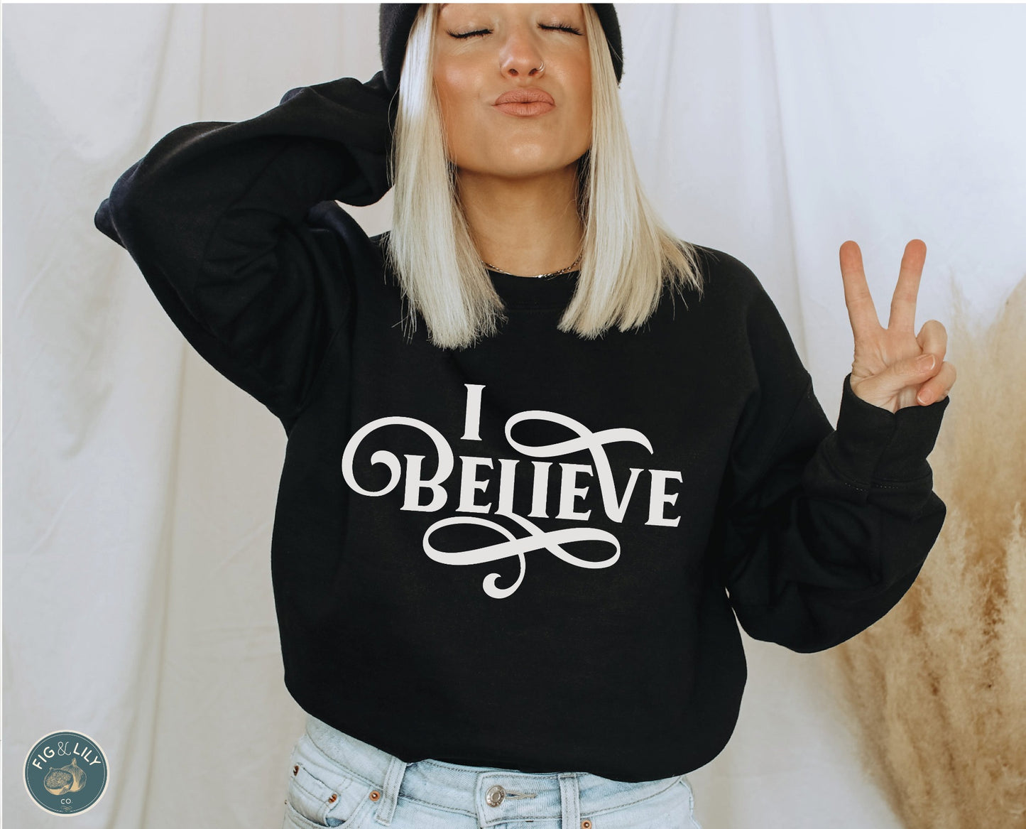 I Believe Swirl Christian aesthetic Jesus believer design printed in white on soft black unisex crewneck sweatshirt for women, great gift for her
