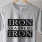 Iron Sharpens Iron Proverbs 27:17 Christian aesthetic block style design printed in black on soft heather gray unisex t-shirt for men's groups