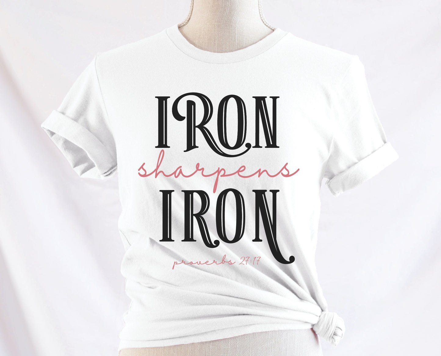 Iron Sharpens Iron Proverbs 27:17 Christian aesthetic design printed in black and mauve on ladies soft white unisex t-shirt for women's groups