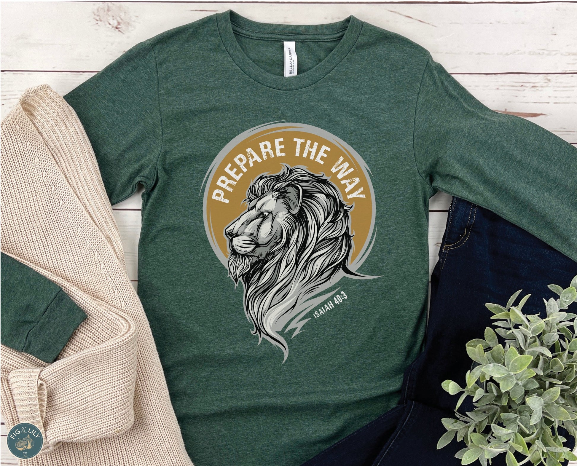 Lion of Judah Prepare the Way Isaiah 40:3 Christian aesthetic design printed in white and gold on soft heather forest green long sleeve tee for men & women