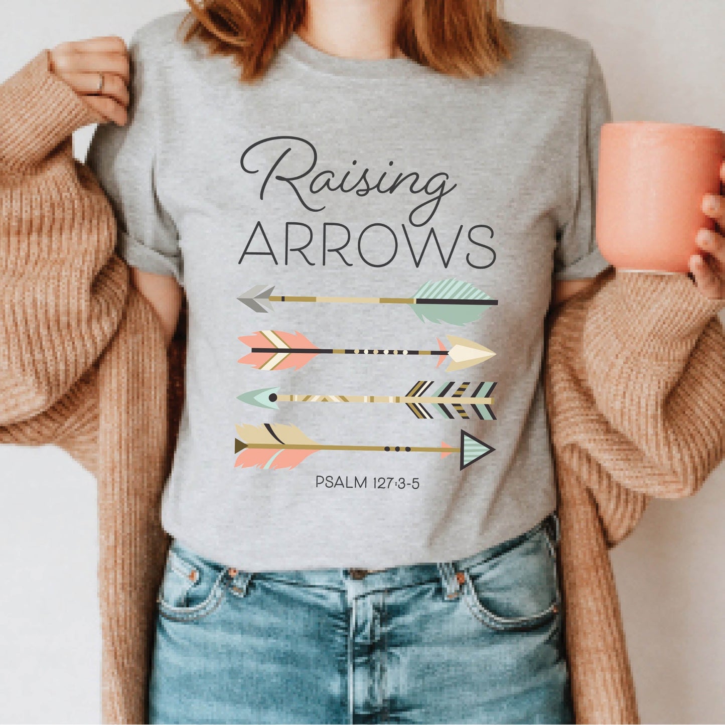 Boho Raising Arrows Psalm 127 Quiver Full Christian aesthetic faith-based design printed in peach, cream, light teal, gold dark gray on soft heather gray unisex t-shirt for women and Moms