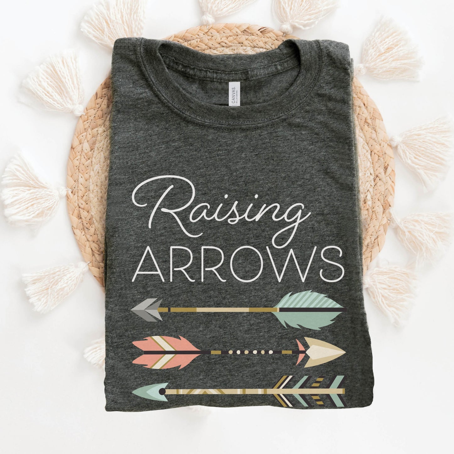 Boho Raising Arrows Psalm 127 Quiver Full Christian aesthetic faith-based design printed in peach, cream, light teal, gold on heather dark gray unisex t-shirt for women and Moms