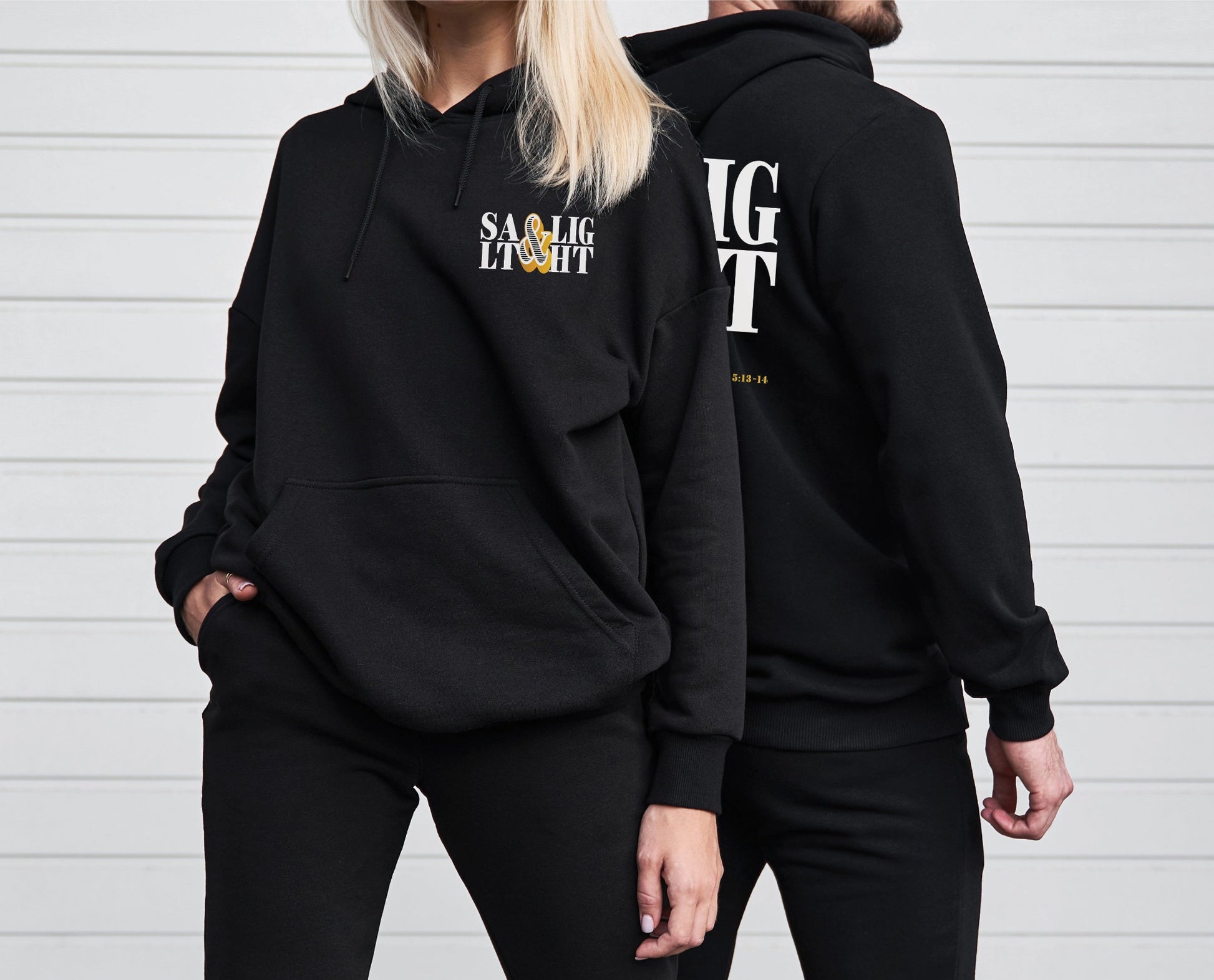 Retro Stacked Salt And Light Matthew 5 Christian bible verse design printed on front and back in white and gold on cozy black unisex hoodie for men and women