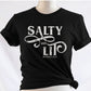 Salty And Lit Matthew 5:13-14 bible verse funny Christian T-Shirt design printed in white on soft black tee for women