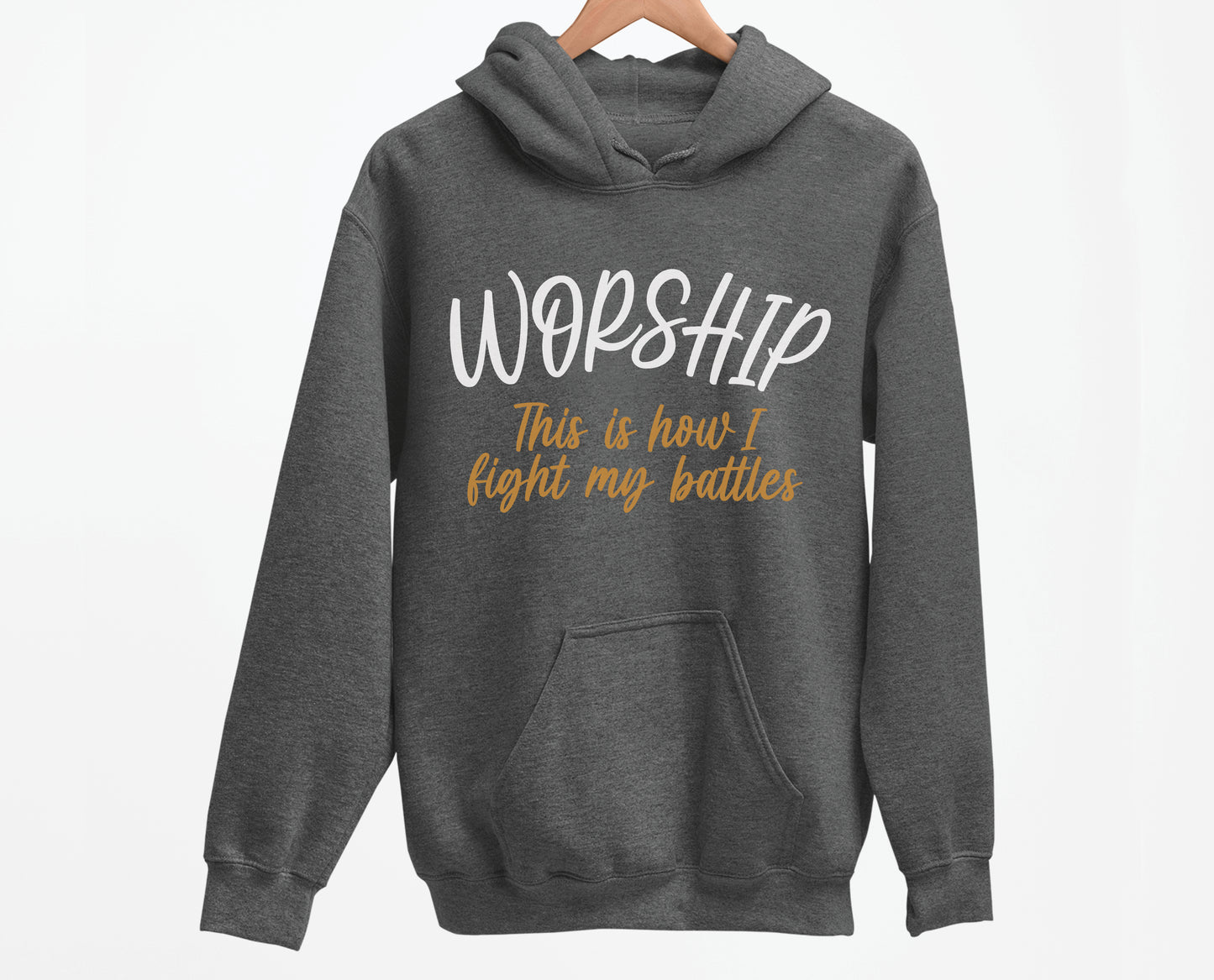 Worship This Is How I Fight My Battles Christian aesthetic design printed in white and gold on cozy heather dark gray unisex hoodie for women and men, great gift for worship leaders