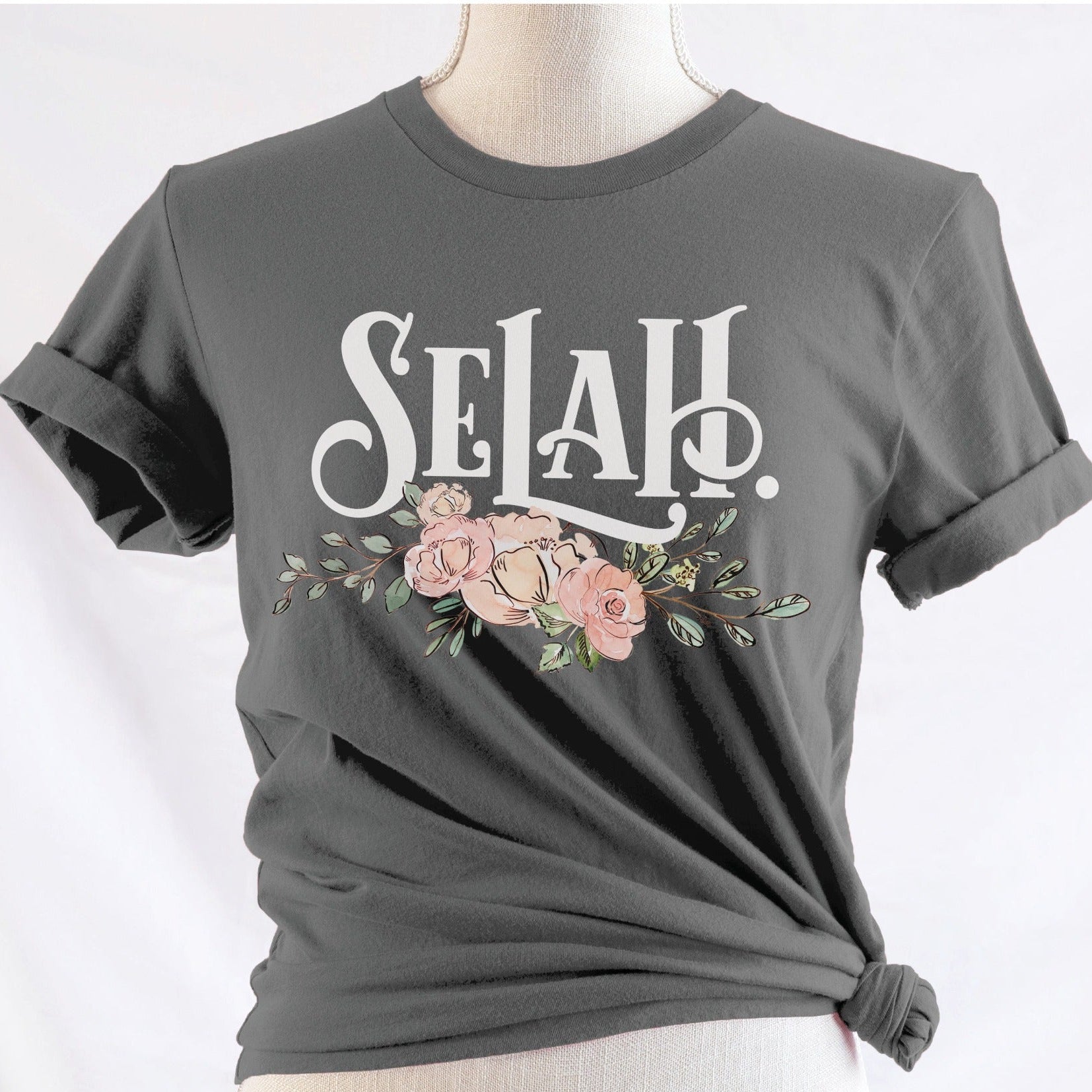 Selah Psalm watercolor floral Christian aesthetic design printed in white peach blush pink on soft asphalt gray t-shirt for women