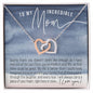 Interlocking hearts rose and white gold necklace gift for Mom with navy blue and pink watercolor message card that says "To My Incredible Mom", perfect present for Mother's Day, in jewelry gift box