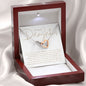 To Our Daughter necklace gift, 2 interlocking hearts necklace in rose gold and surgical steel silver with personalized heartfelt message card from mom and dad, with luxury mahogany LED light jewelry gift box