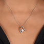 Woman wearing a Forever Love white gold heart Necklace Gift for Mom with a floral Christian God quote message card that says To My Beautiful Mom, perfect for Mother's Day, in jewelry gift box