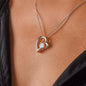 Woman wearing a Happy Mother's Day Mom Forever Love Heart Silver Necklace Gift with heartfelt and funny message card that says, thank you I love you more, the end, I win, from your favorite child with jewelry gift box