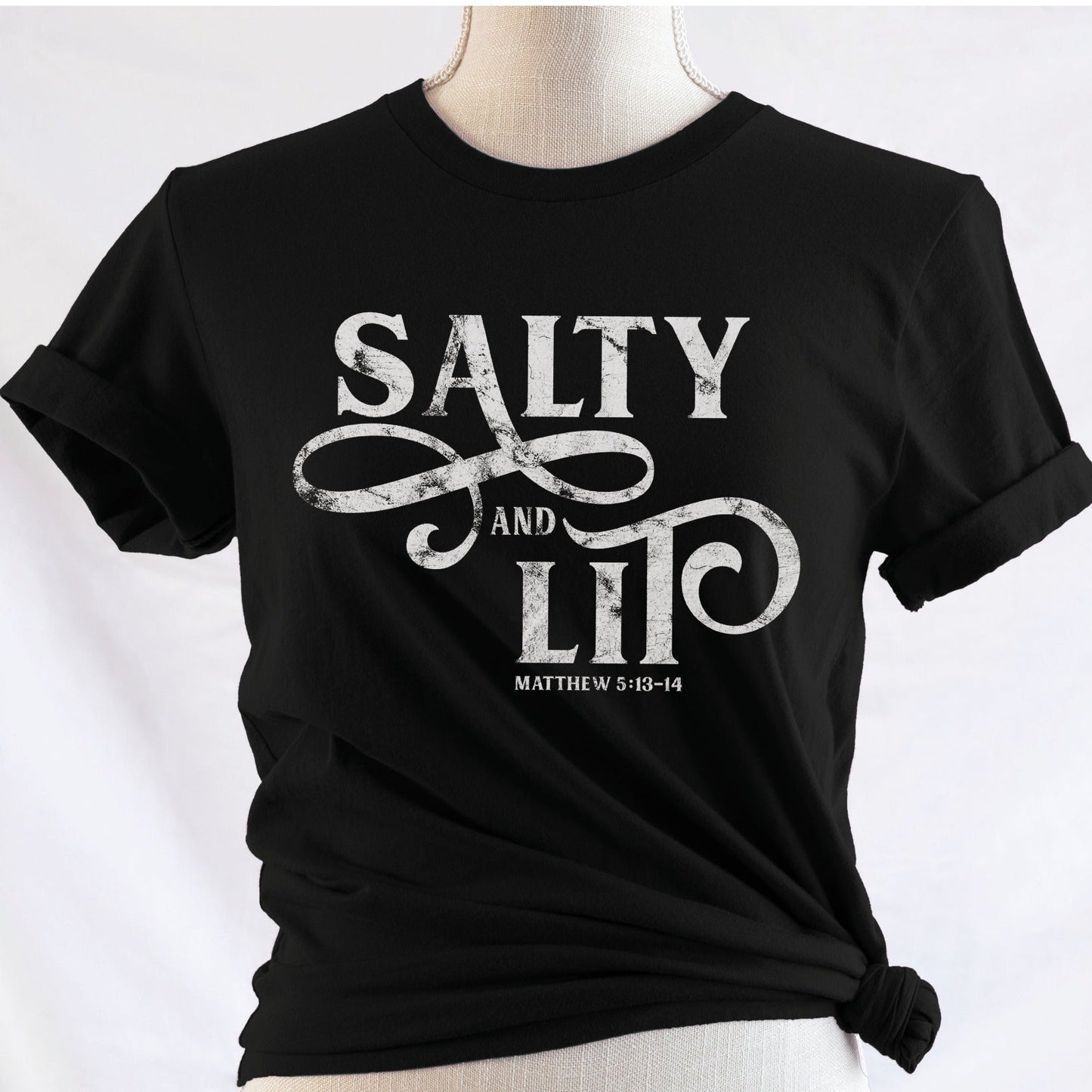 Salty And Lit Matthew 5:13-14 bible verse funny Christian T-Shirt design printed in white on soft black tee for women