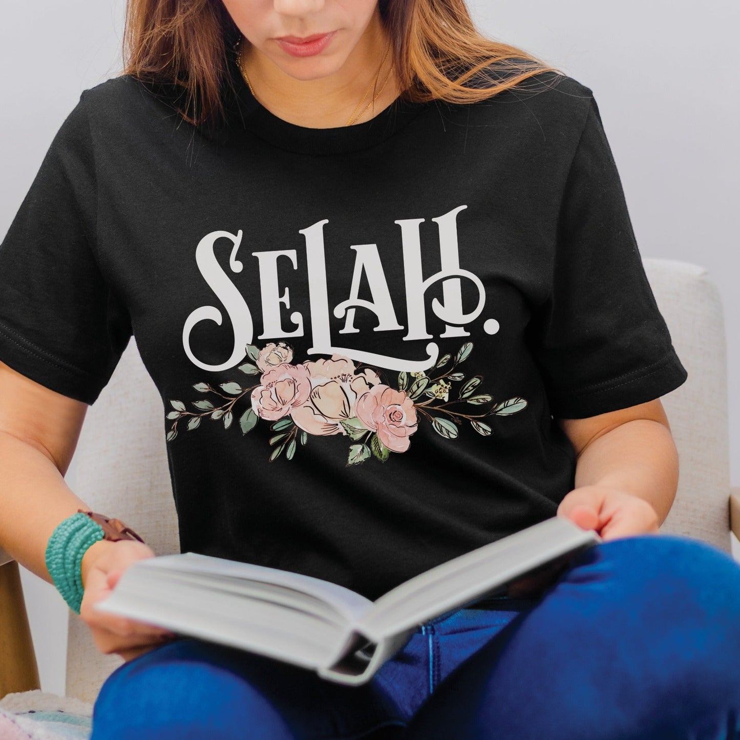 Selah Psalm bible verse watercolor floral Christian aesthetic design printed in white peach blush pink on soft black t-shirt for women