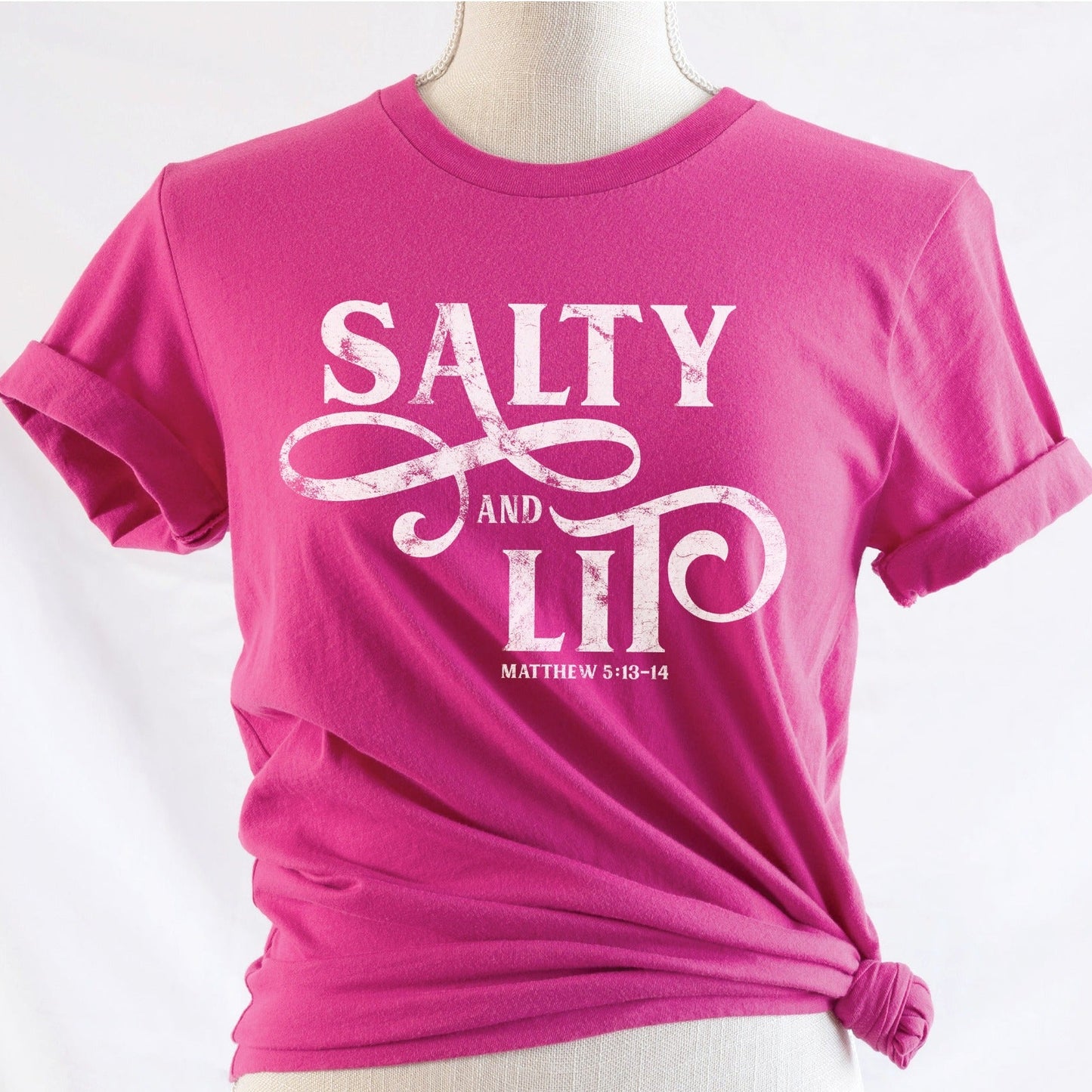 Salty And Lit Matthew 5:13-14 bible verse funny Christian T-Shirt design printed in white on soft berry hot pink tee for women