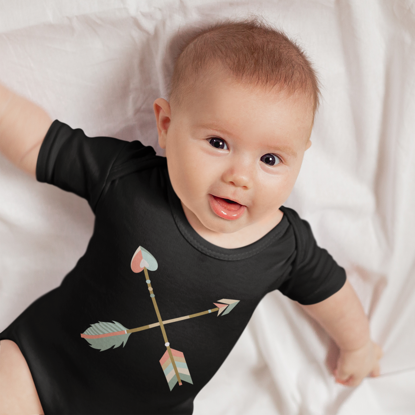 Cute 2 month old baby wearing a criss cross boho arrows black neutral baby onesie bodysuit for boys and girls, matching mommy-and-me Christian Raising Arrows Psalm 127:4-5 scripture faith-based Mom T-Shirt