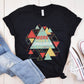 Black "More Than A Conqueror" Romans 8:37 bible verse scripture unisex faith-based Christian Bella Canvas 3001 t-shirt, with bright and colorful geometric triangles pattern, made in the USA for Men and Women Jesus believers