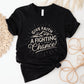 Black Unisex Tee with Christian Bible verse quote that says, "Give Faith A Fighting Chance" with retro sunburst and mountain graphics, designed for faith-based men and women