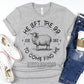Gray Christian unisex t-shirt laying on a on a white background with He Left the 99 to Come Find Me Jesus Christ Luke 15 bible verse and vintage sheep illustration graphic and distressed text printed in black