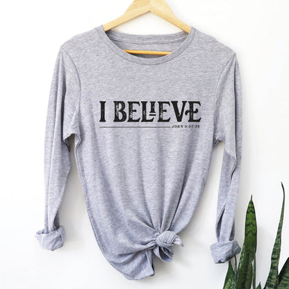 Heather sport gray unisex long sleeve unisex Christian t-shirt featuring distressed 'I Believe - John 9:35-38' Bible verse print, perfect for men and women expressing their faith