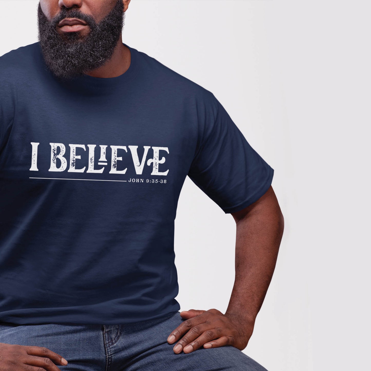 Navy blue unisex Christian t-shirt featuring distressed 'I Believe - John 9:35-38' Bible verse print in white, perfect for men and women expressing their faith