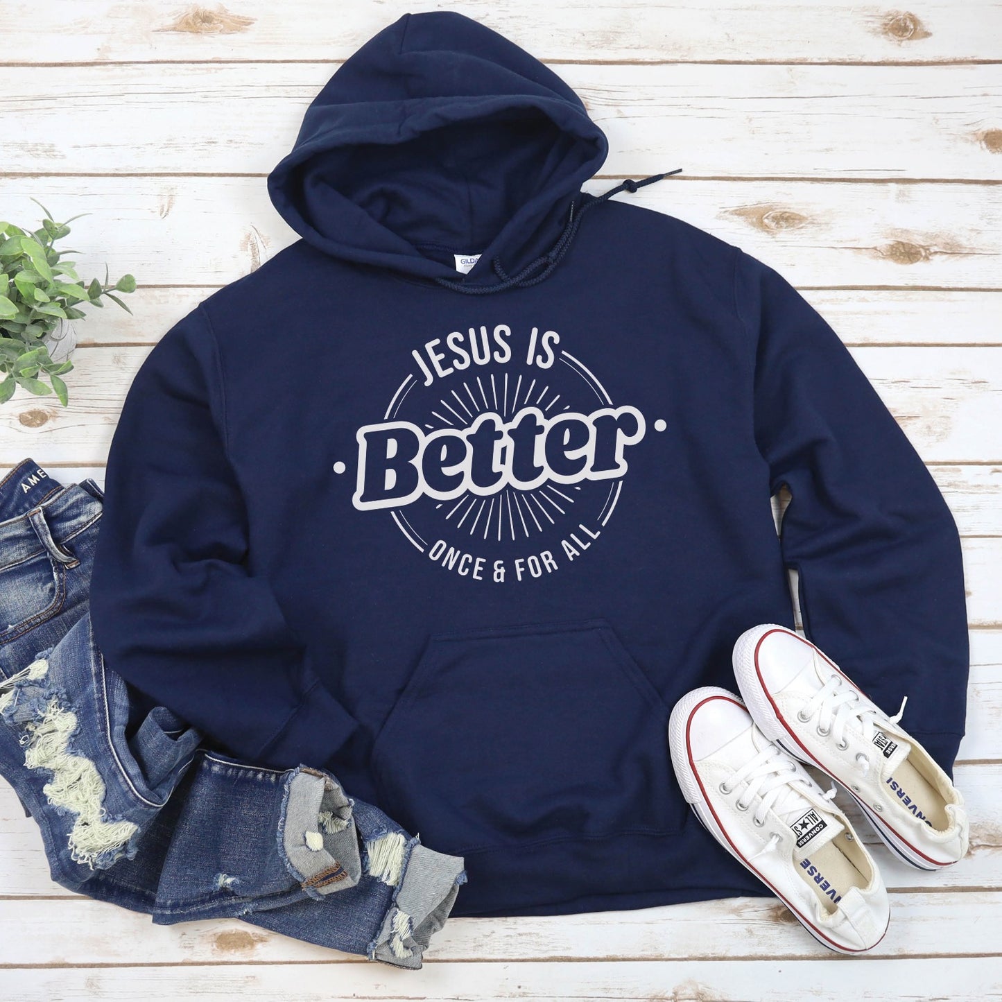 Navy blue color faith-based oversized cozy hoodie with "Jesus is BETTER - Once and For All" logo style design in white, created for Christian men and women