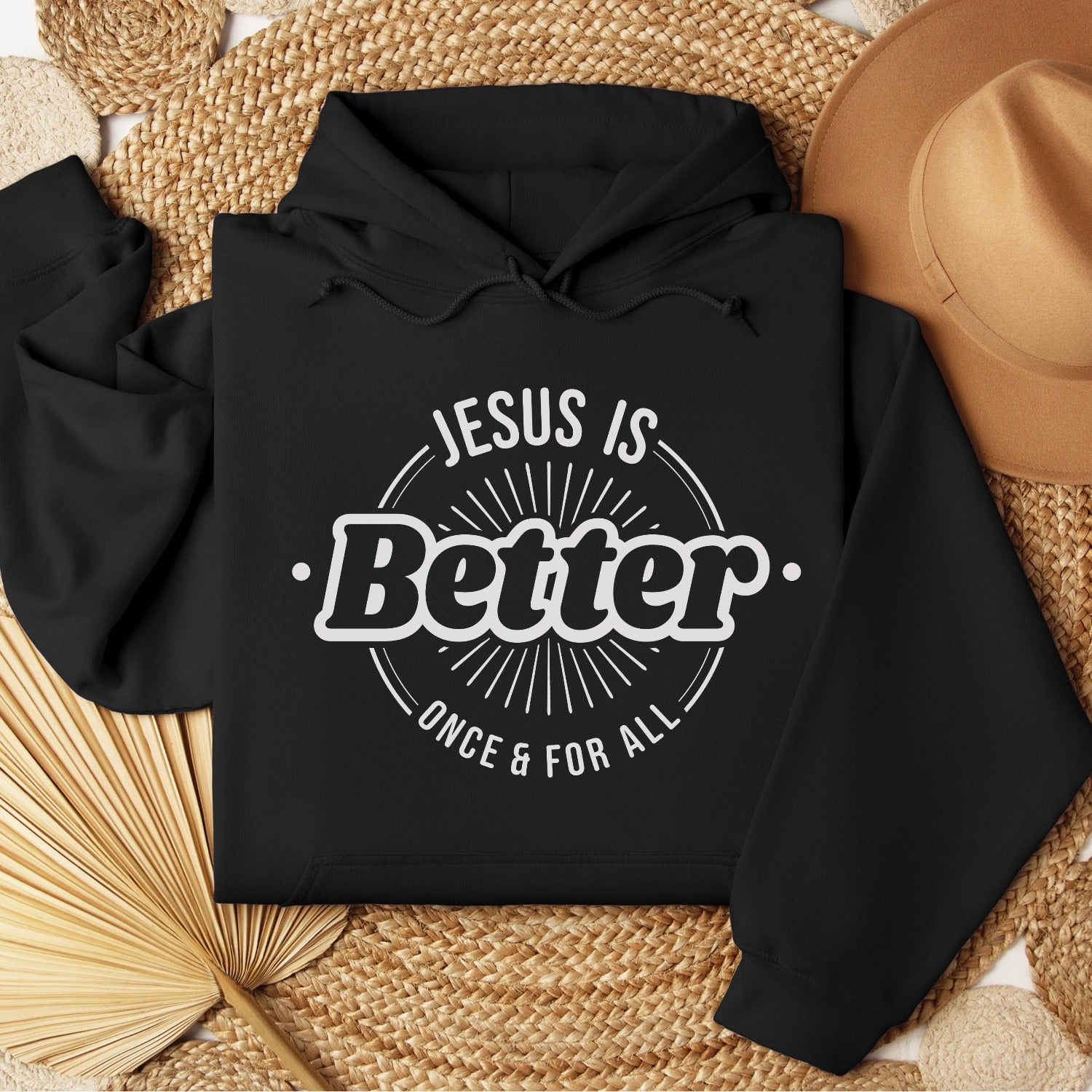 Black color faith-based oversized cozy hoodie with "Jesus is BETTER - Once and For All" logo style design in white, created for Christian men and women