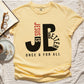 Butter soft yellow color JB typography Jesus is Better Once and For All Christian book of Hebrews Unisex Comfort Colors C1717 t-shirt, created for faith-based women and men