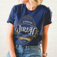 Navy blue and gold Christian faith-based unisex t-shirt featuring a gold ornamental blackletter-style frame design with the text 'Jehovah Jireh The Lord My Provider' and 'Genesis 22:14' Bible verse, inspirational statement religious apparel for men and women