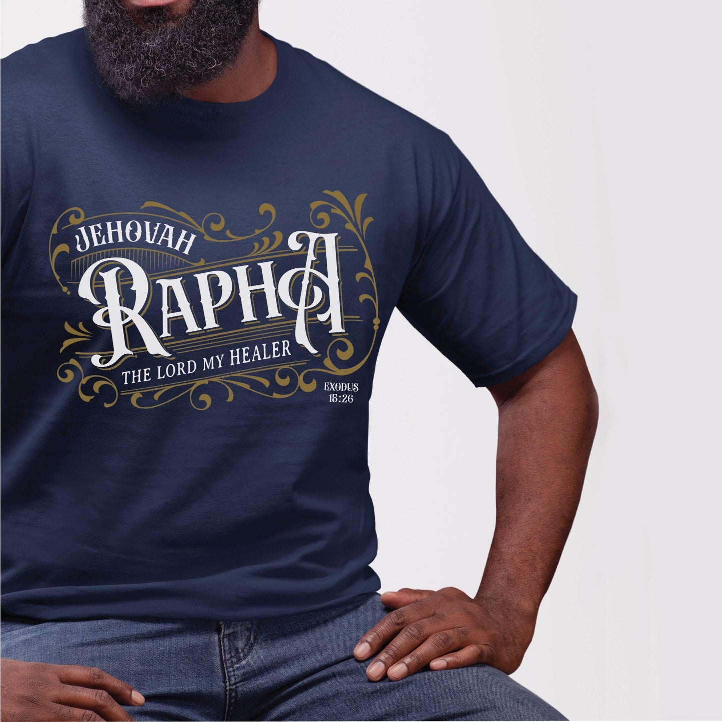 Bearded black man wearing a navy blue "Jehovah Rapha, The Lord My Healer" Exodus 16:26 bible verse Hebrew meaning unisex Christian t-shirt designed for men and women