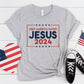 Athletic Heather Gray stars and stripes Presidential election vote unisex Christian t-shirt, Jesus 2024 Keep America Saved" in bold red, white, and blue fonts, made in the USA, made for men and women God & Country Patriots
