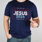 Patriotic man wearing a navy blue stars and stripes Presidential election vote unisex Christian t-shirt, Jesus 2024 Keep America Saved" in bold red, white, and blue fonts, made in the USA, made for men and women God & Country Patriots
