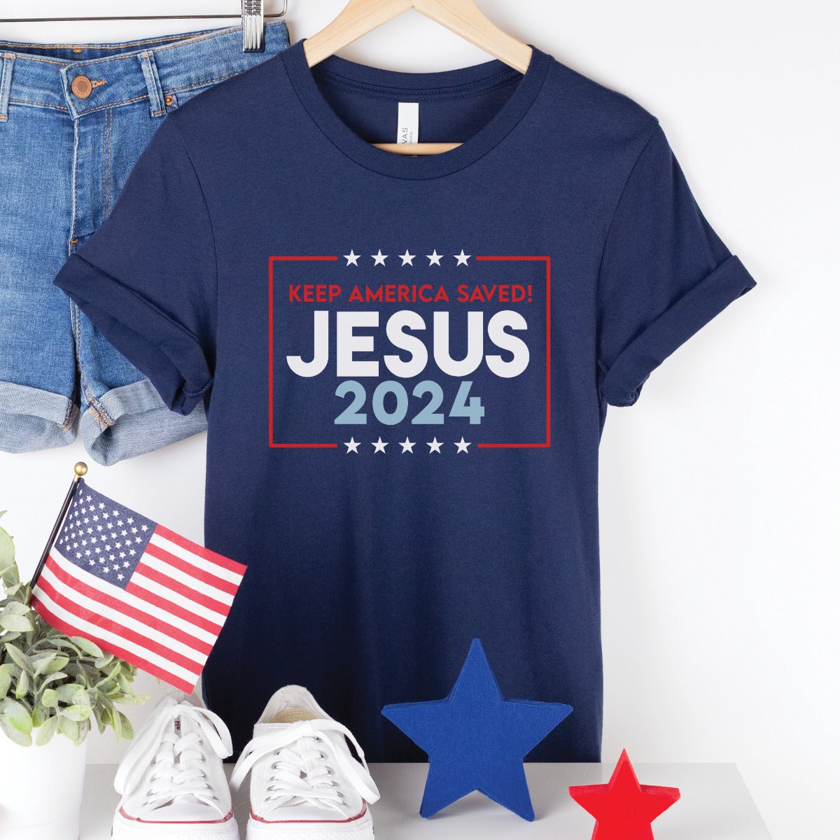 Patriotic navy blue Bella Canvas 3001 Presidential election vote unisex Christian t-shirt, Jesus 2024 Keep America Saved" in bold red, white, and blue fonts, made in the USA, made for men and women God & Country Patriots