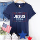 Patriotic navy blue President election vote unisex Christian t-shirt with "Jesus 2024 - Keep America Saved" and stars printed in bold red, white, and blue fonts, made in the USA, made for men and women God & Country Patriots