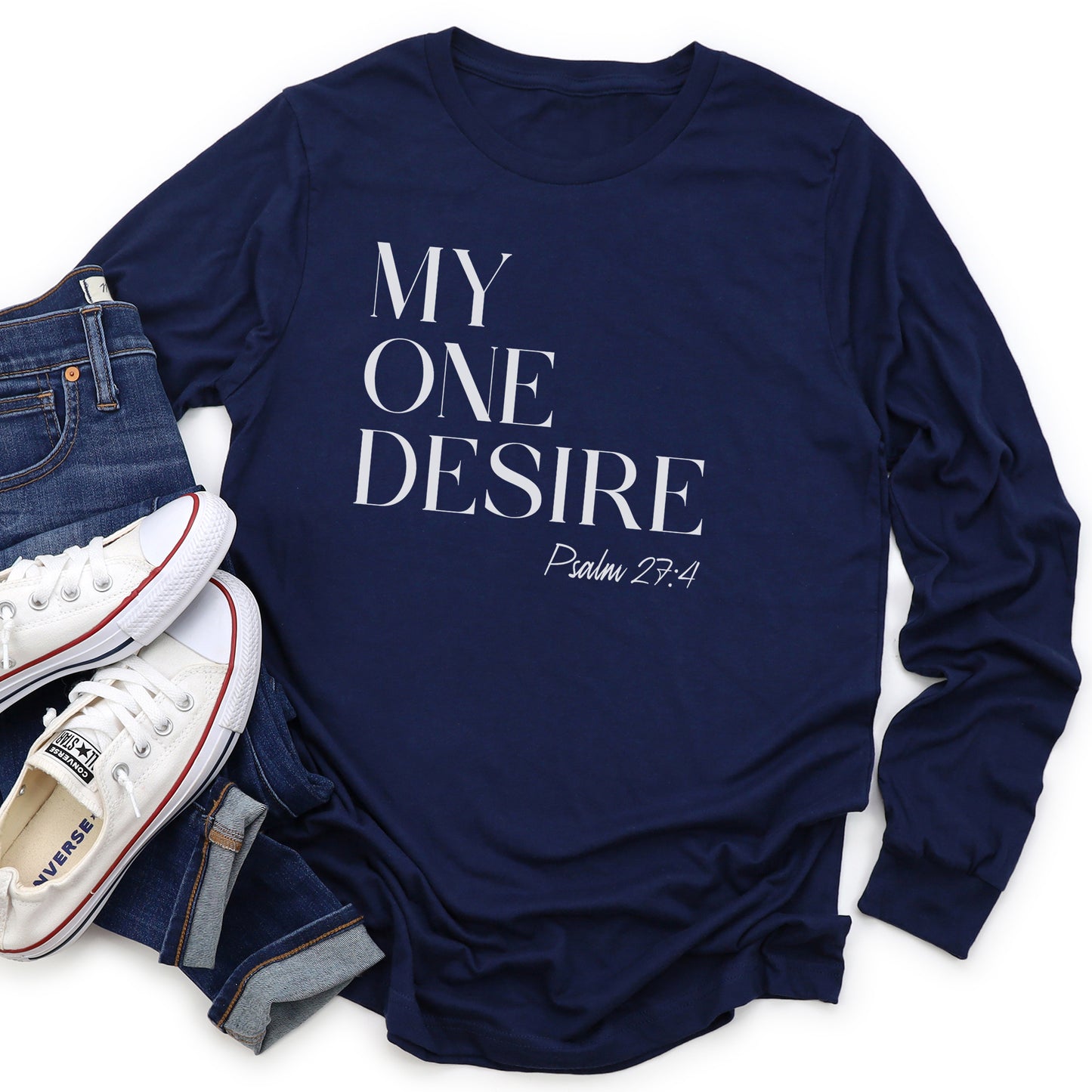 Navy blue cozy soft long sleeve Christian unisex t-shirt with simple modern My One Desire Psalm 27:4 bible verse message printed on front side in white text, designed for both men and women 